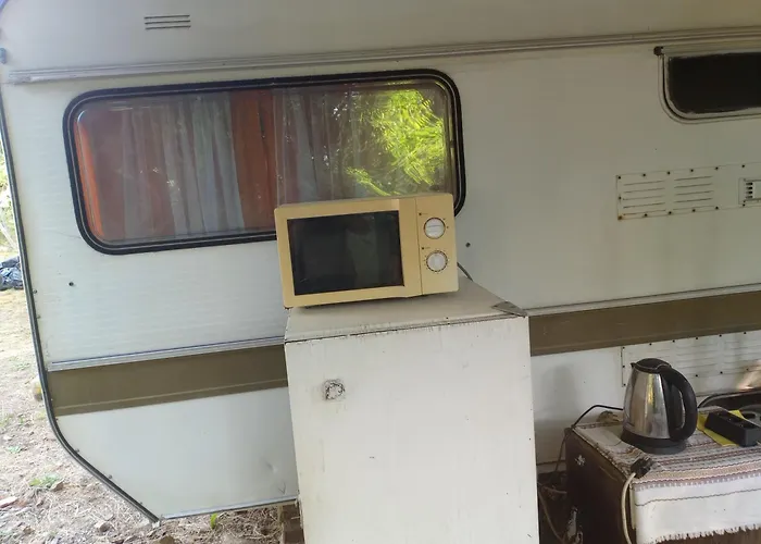 بيت خشبي с терасата *